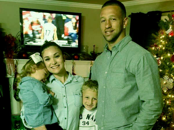 Image of Caption: Jay Paul with his wife Ashleigh Price along with their two kids